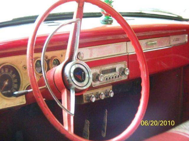 1963-plymouth-valiant-v200-4-door-white-exterior-redblack-interior-nice-dash-2.jpg