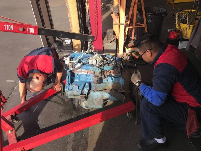 5-Mechanics Removing Old Engine.jpg
