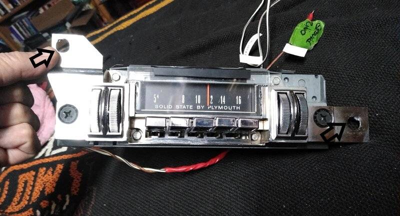 69 Cuda radio offset mounting holes 1.jpg