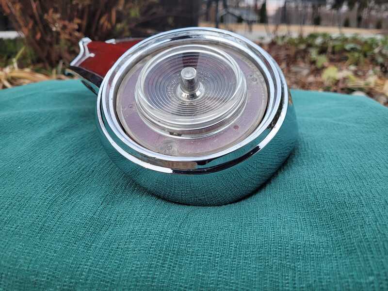 May be an image of hood ornament