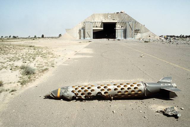 a-french-blg-66-belouga-bomb-lies-on-the-airfield-with-a-bombed-out-hardened-ff6715-640.jpg