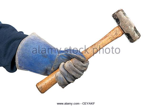 a-man-holding-a-small-beat-up-sledgehammer-while-wearing-old-worn-ceyakf.jpg