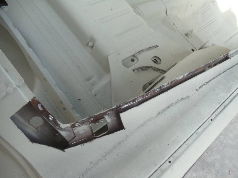 Barracuda rear window rust repair.jpeg