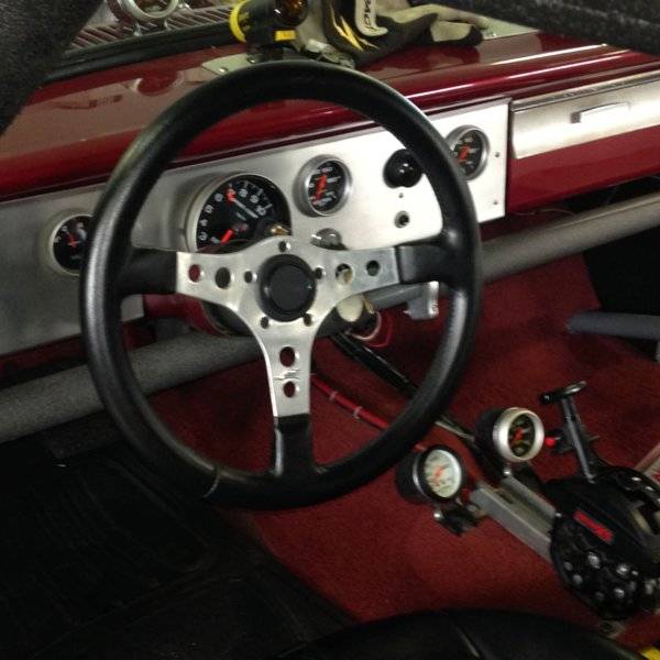 Dash and steering wheel in 65.JPG