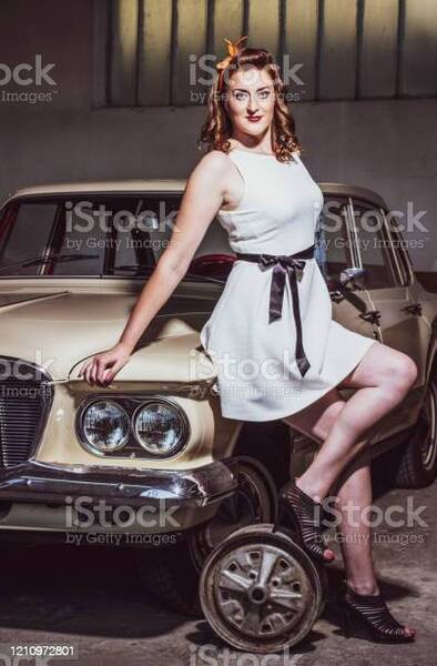 female-driver-and-her-vintage-car-picture-id1210972801?s=612x612.jpg