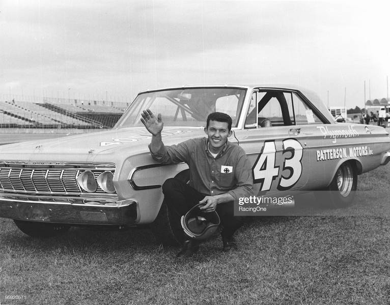 hard-petty-poses-for-a-photo-in-front-of-his-dodge-plymouth-circa-picture-id95920571?s=2048x2048.jpg