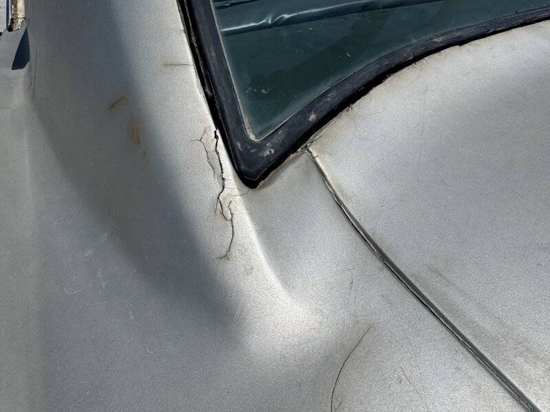 left rear window damage.jpg