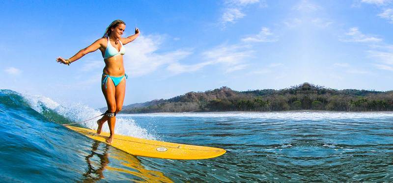 Longboard-girl-Costa-Rica-Surf-Vacations.jpg