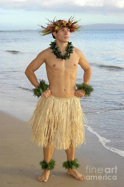 male-hula-dancer-poses-with-hand-on-hips-at-sunset-by-the-beach-gunther-allen.jpg
