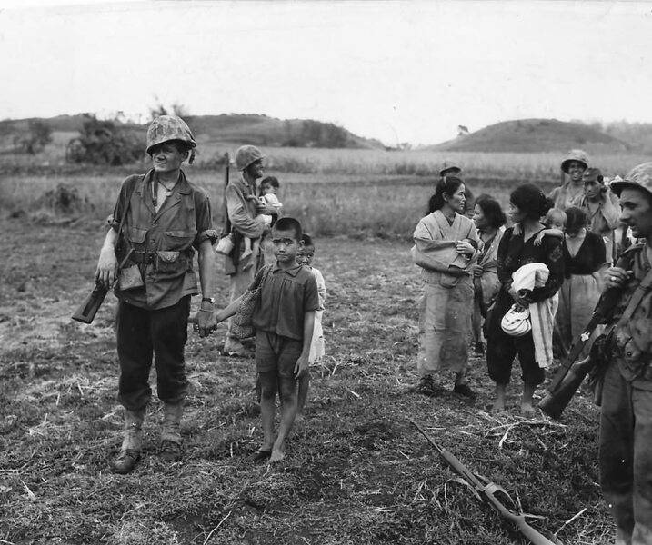 Marines_Lead_Japanese_Women_and_Children_to_Safety_on_Saipan.jpg