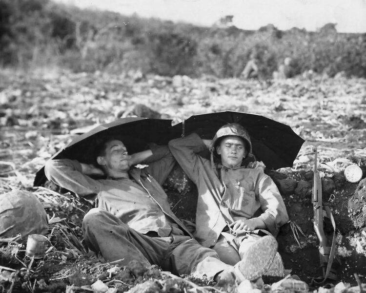 Marines_Resting_in_Foxhole_after_Battle_on_Saipan.jpg