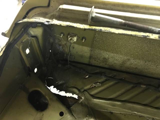 old bodywork rear trunk damage.jpg
