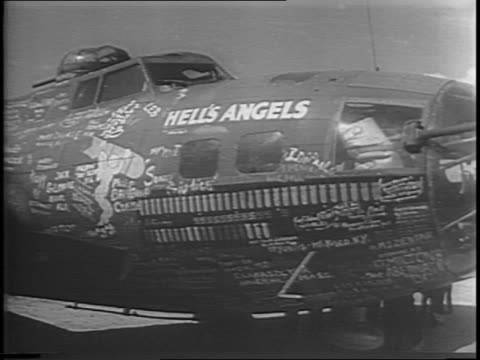 ontage-of-hells-angels-bomber-moving-slowly-down-a-runway-closeup-on-video-id504407865?s=640x640.jpg