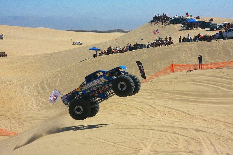 Pismo-Beach-Huckfest-2013__35_-Pat-Gerber-Shocker-Monster-Truck-coming-off-sand-dune.jpg