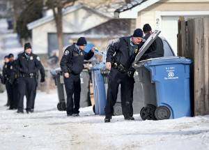 Police-search-garbage-300x215.jpg