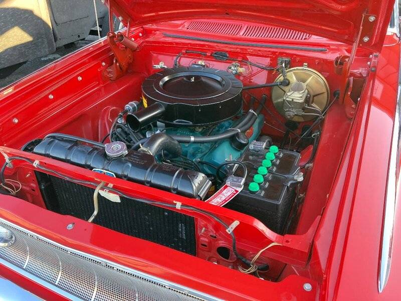 red 62 Plymouth Sports Fury motor.jpg