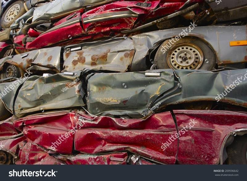 stock-photo-crushed-cars-209596642.jpg