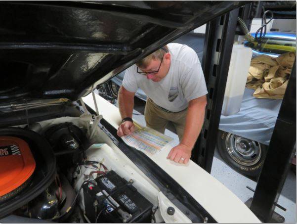 TA owner comparing his just delivered broadcast sheet to his fender tag.JPG