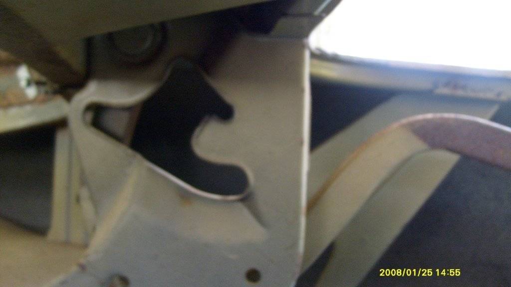 trunk hinge and spring bracket.JPG