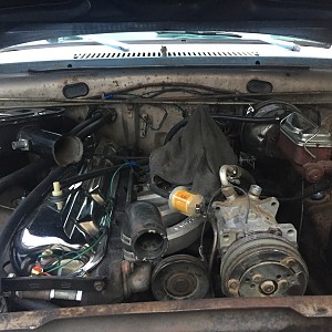 engine bay - super six and ac install in progress 3-19.JPG