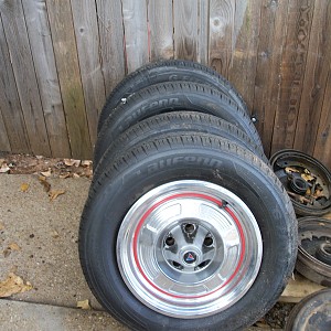 For Sale Vintage 4 new 175/70/R13 tires 5-4 lugs, w/OE Plymouth hub caps.